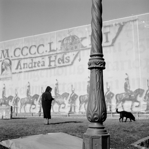 Women walking dog near Budapest Castle